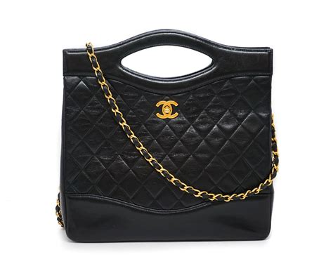 black chanel side bag|vintage Black Chanel bag.